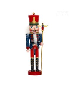 Dekor Deluxe Figura vojaka hrestača v  rdeče modri uniformi z velikim klobukom belo brado in lasmi in s palico v roki. 