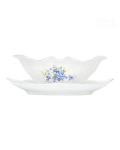 Dekor Deluxe omačnica bele barve iz vrhunskega porcelana z nežno poslikavo s spominčicami.