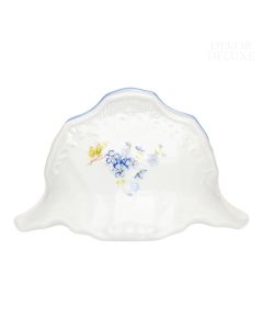 Dekor Deluxe stojalo za prtičke bele barve iz vrhunskega porcelana z nežno poslikavo s spominčicami.