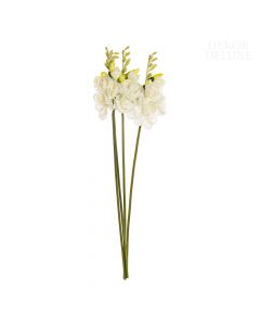 Dekor Deluxe - umetne rože, šopek štirih velikih belih frezij z bogatimi cvetovi, rumenozelenimi popki na vrhu in temnozelenim steblom.