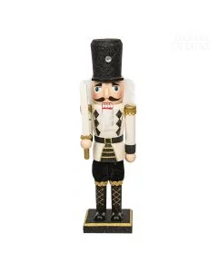 Dekor Deluxe Figura vojaka hrestača na črnem podstavku z mečem v roki v črno beli uniformi z zlatimi dodatki, črno kapo, belo brado in lasmi.