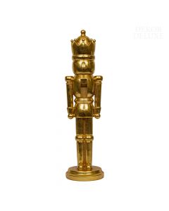 Dekor Deluxe Zlata figura vojaka hrestača s krono z zlatimi bleščicami na podstavku.