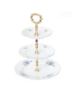 Dekor Deluxe tri nadstropni etažer bele barve iz vrhunskega porcelana s poslikavo s spominčicami.