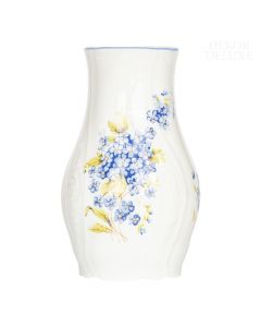 Dekor Deluxe vaza iz vrhunskega belega porcelana z nežno reliefno dekoracijo in poslikavo s spominčicami.